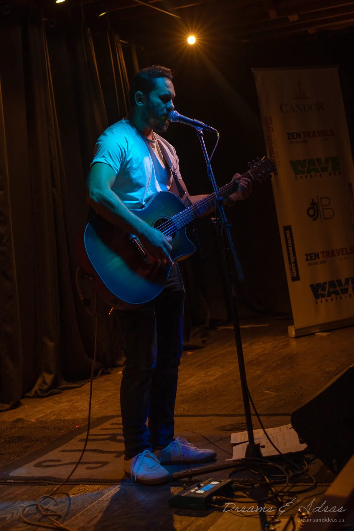 Saurav MP performing live with guitar and vocals